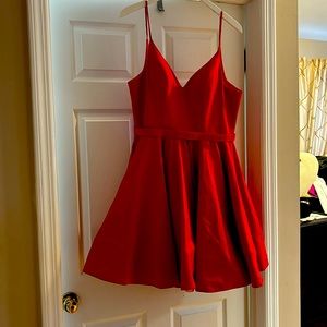 IEENA DUGGAL Bright red dress